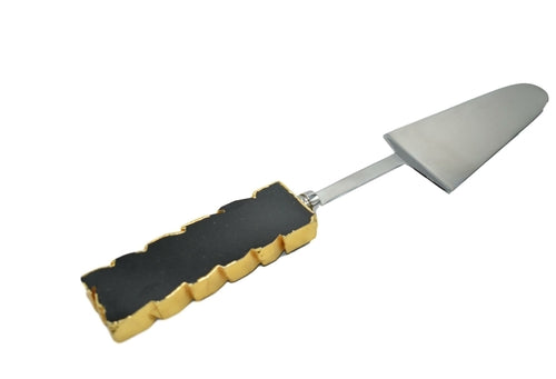 Elegante Kuchenschaufel mit Goldrand